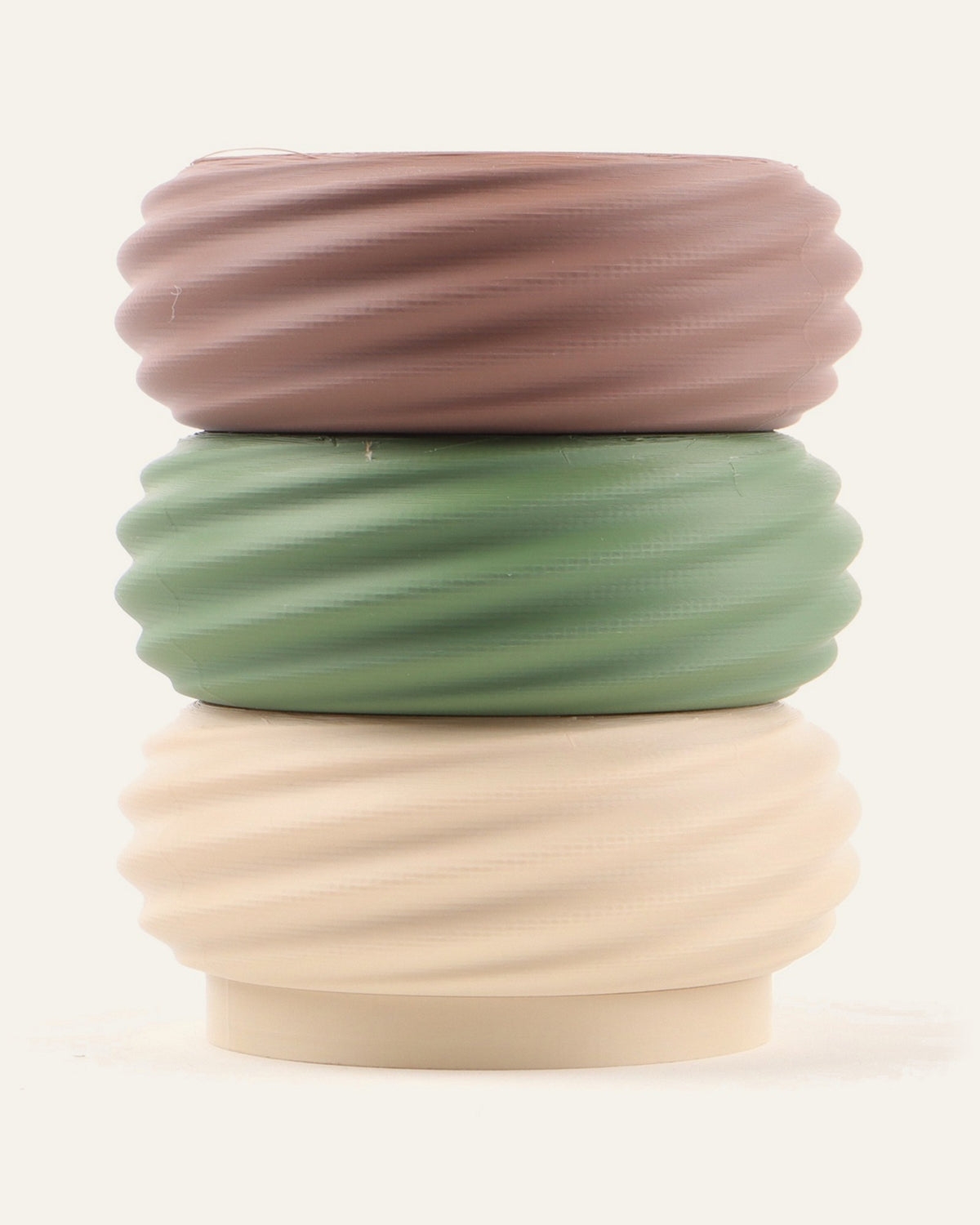 Driftwood, a three-module modular vase in brown, olive green and light khaki