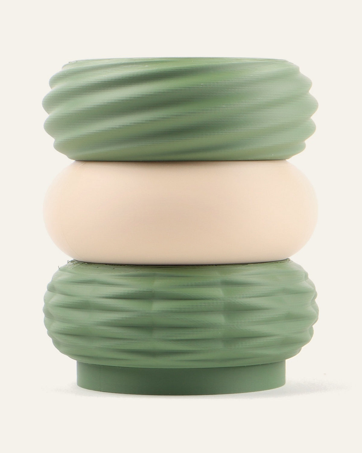 Sage, a three-module modular vase in olive green around light khaki