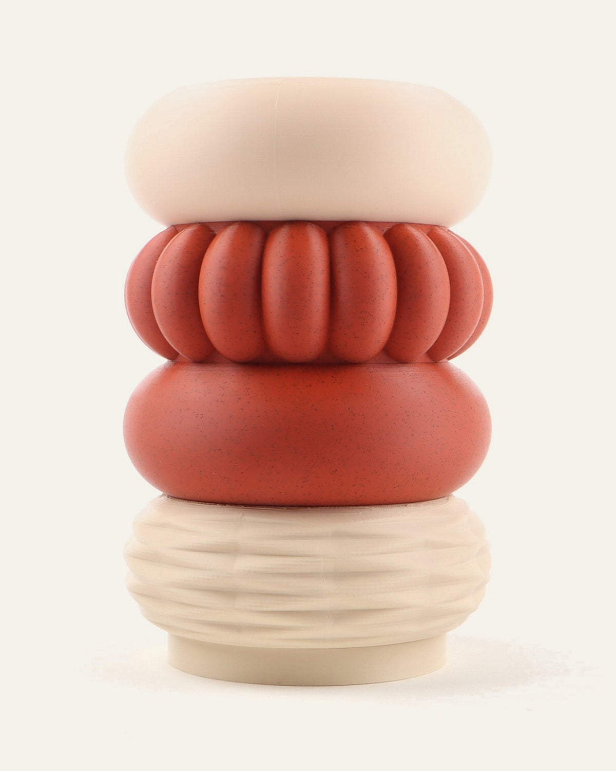 Clay, a four-module modular vase in terracotta framed by light khaki