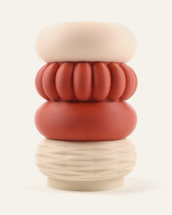 Clay, a four-module modular vase in terracotta framed by light khaki