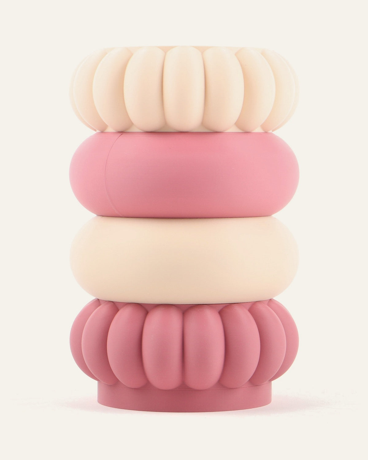 Macaron, a four-module modular vase in alternating rose and light khaki