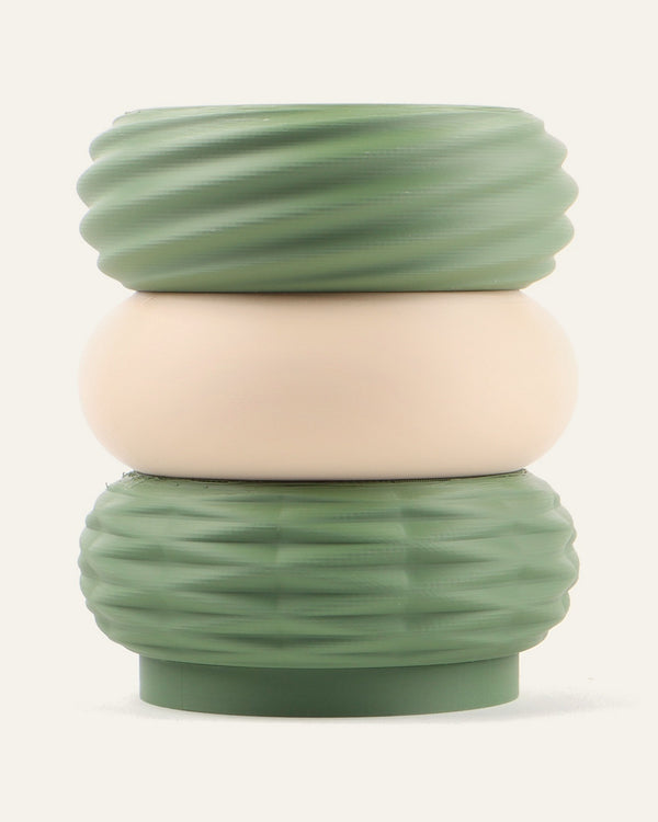 Sage, a three-module modular vase in olive green around light khaki