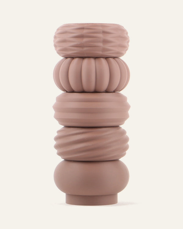 Timber, a five-module modular vase in Matte Brown, one of each profile