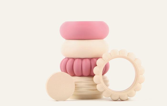 Stacked modular vase beside a Refined Design branded base plate and a scalloped module